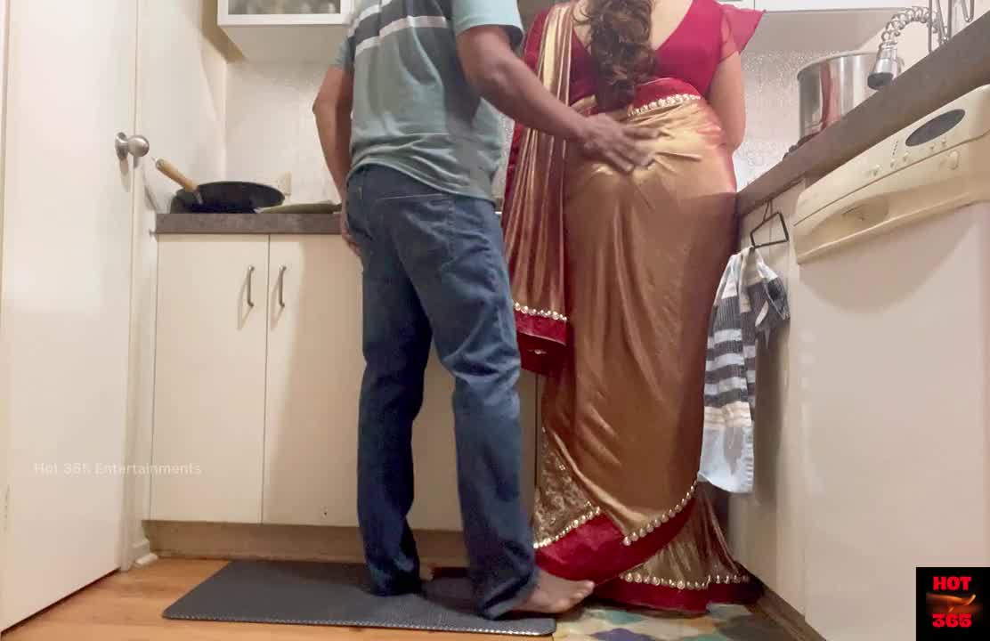 indian couple romance in the kitchen - saree hook-up - saree lifted up and backside smacked photo